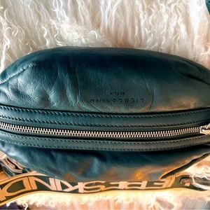 New, never worn Crossbody bag- item sold is Blue